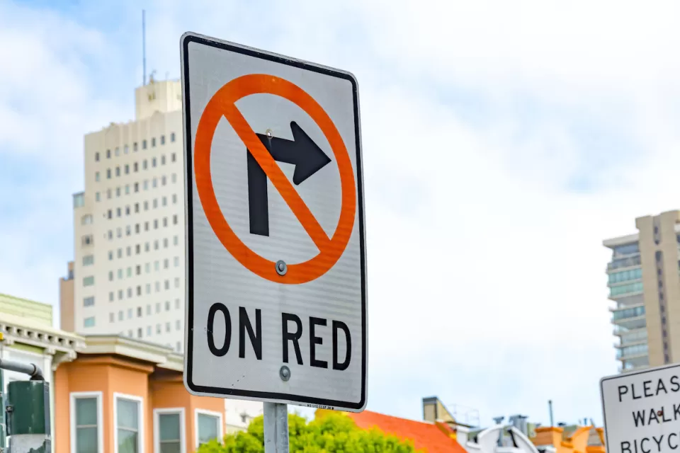 Close-up of 'No Right Turn on Red' sign in San Francisco, California.